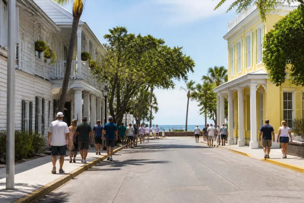 Travelers exploring Old Town Key West on foot