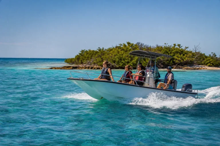 Small adventure charter boat traveling across the water near Key West
