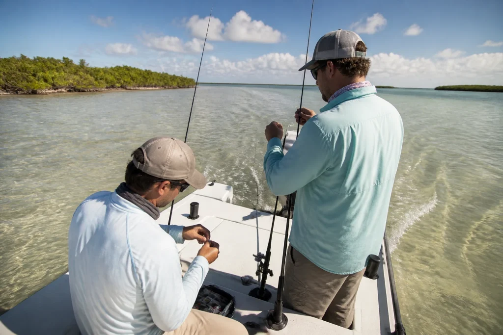 Anglers preparing gear on a Key West backcountry bay boat