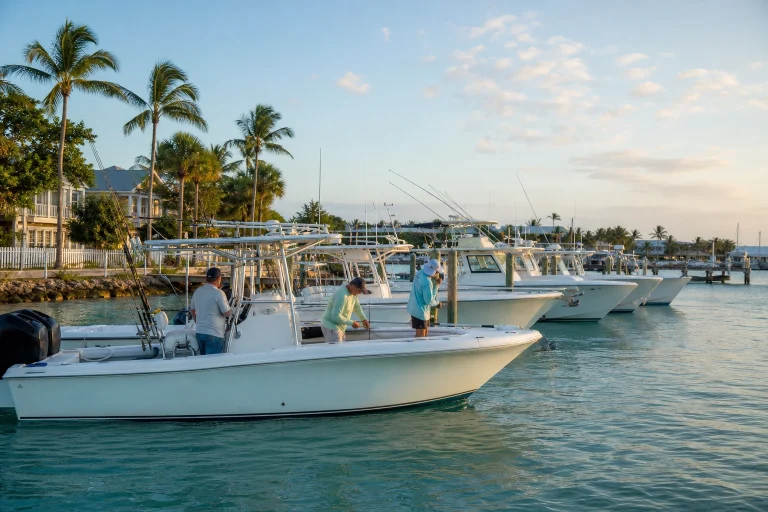 Sport-fishing boats moored at a Key West waterfront marina in the morning.