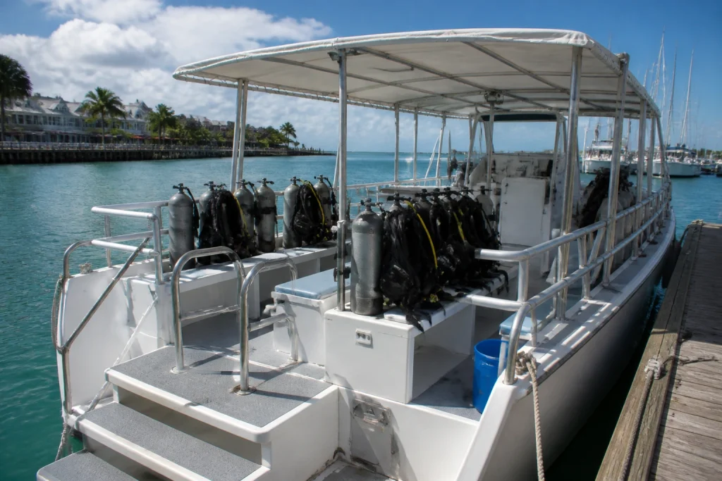 Boarding area and seating on a small Key West dive charter boat