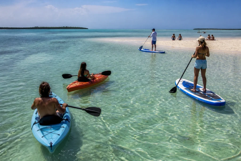 Kayaks and paddleboards near a Key West sandbar