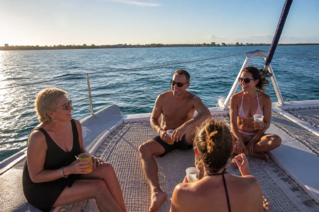 Guests relaxing aboard a Key West sunset snorkel cruise