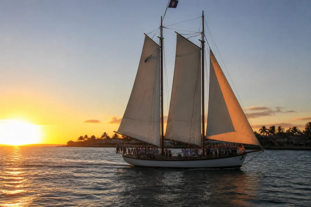 Traditional schooner sailing near Key West at sunset