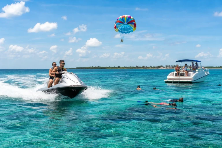 Jet skiing, parasailing and snorkeling during a Key West water sports outing